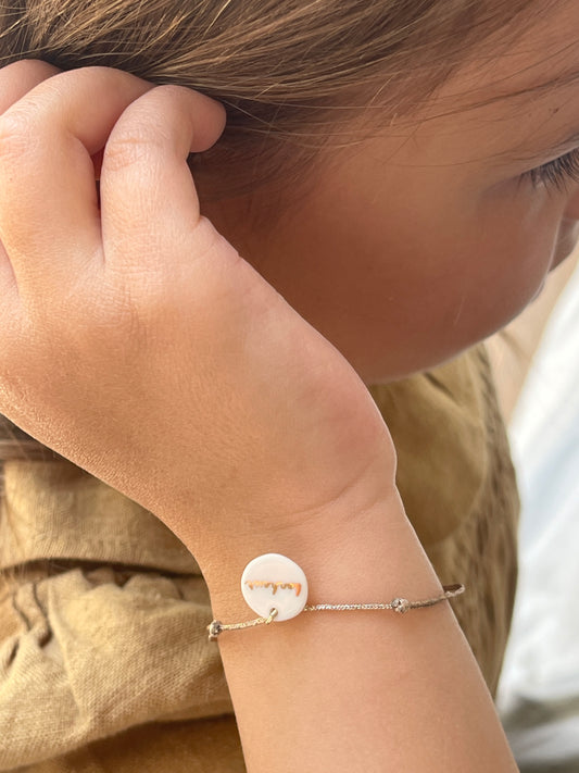 Bracelet Médaillon Bonheur cordon doré